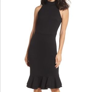 NWT black sheath dress with ruffle hem